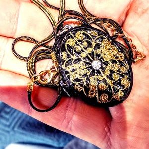 Gold on black handmade locket on black chain